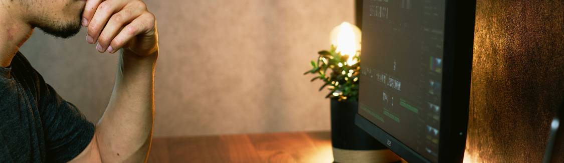 Stock photo: Developer working privately on computer, representing client-side only data generation. No data leaves the browser.